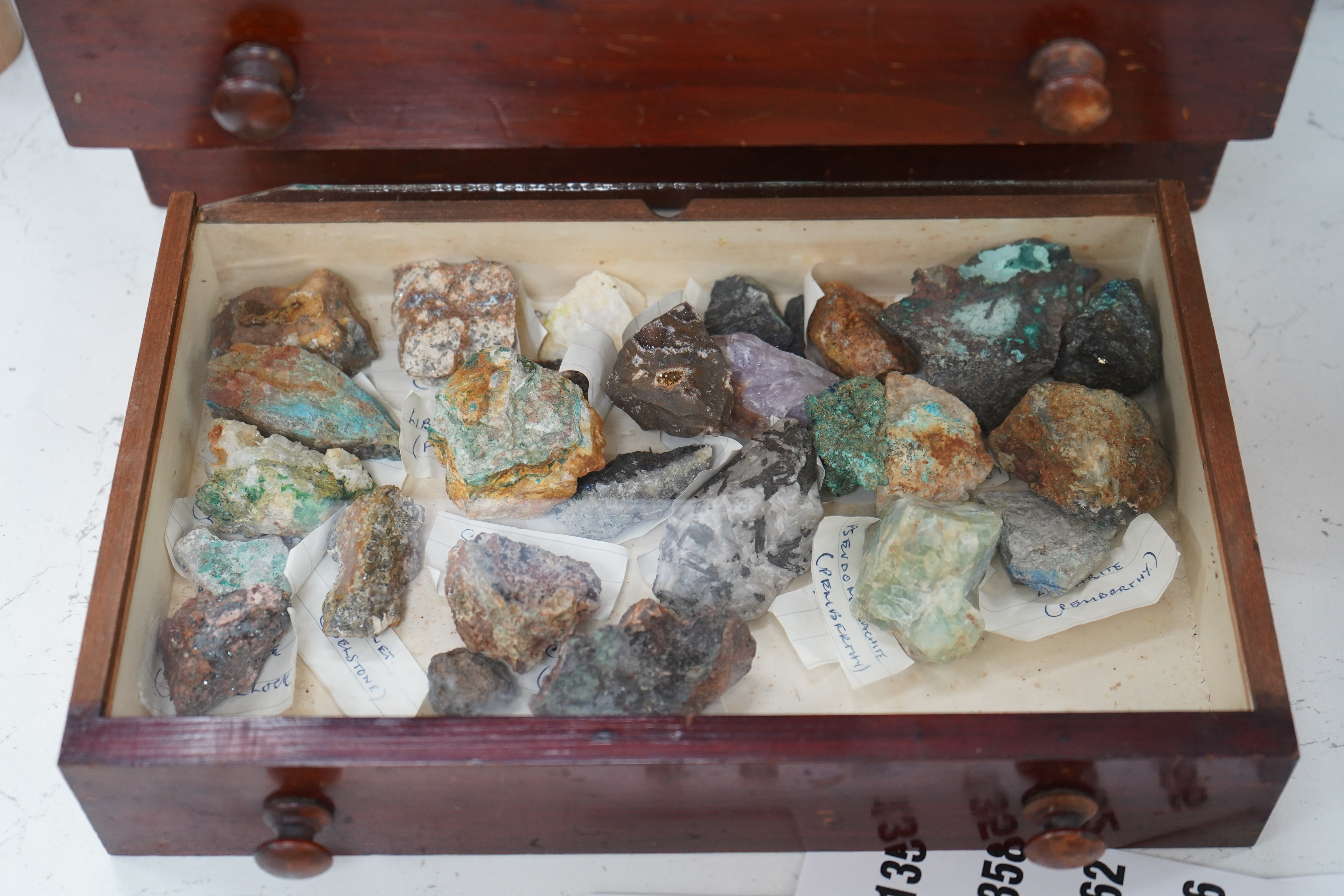 An early 20th century collector’s chest fitted with five drawers filled with mineral specimens and butterflies to include Haematite, Scorodite and Pyrite, 30cm high. Condition - fair